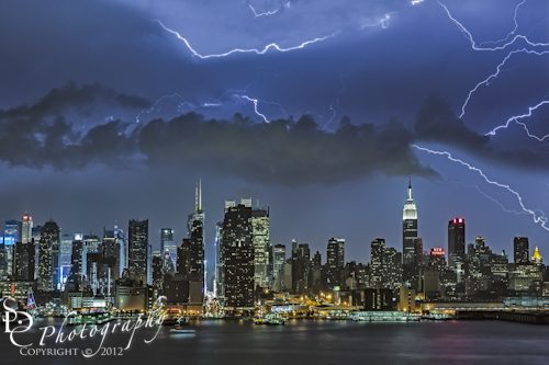 Thunder and Lightning storms over the New York City skyline.
