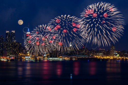 Fireworks and Full Moon Over New York City